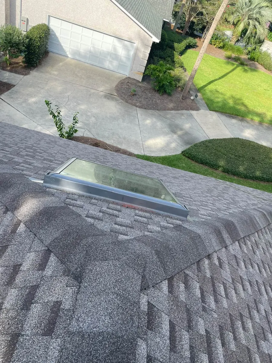 Skylight flashed into a new shingle roof